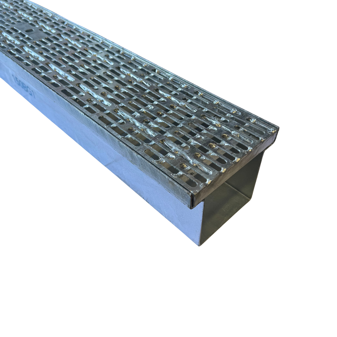 A silver galvanised metal trench box grate with a geometric pattern design.