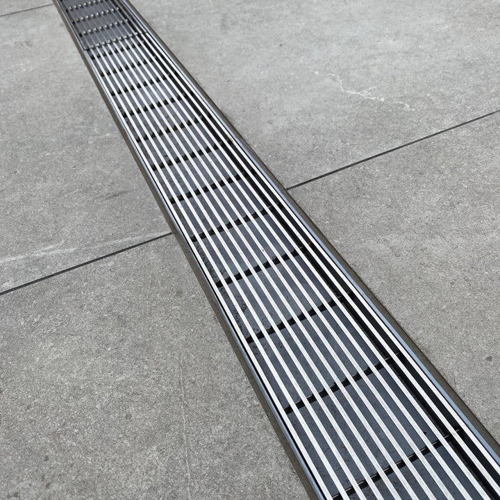 Linear Drain with Adjustable Outlet