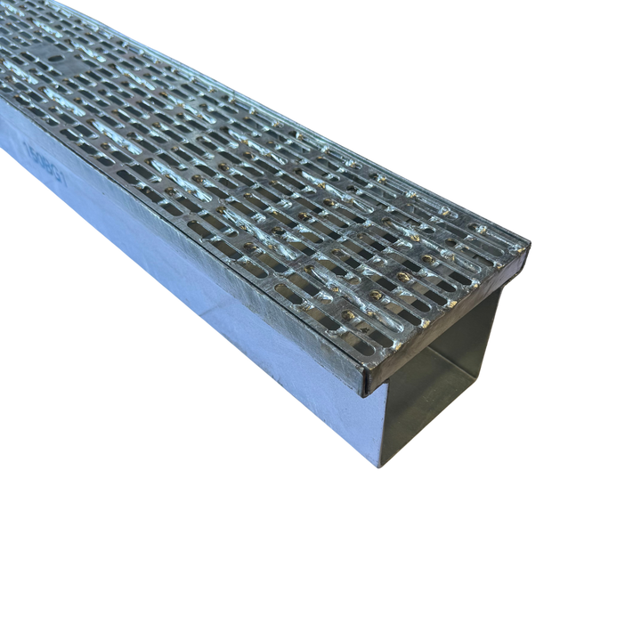 A silver galvanised metal trench box grate with a geometric pattern design.